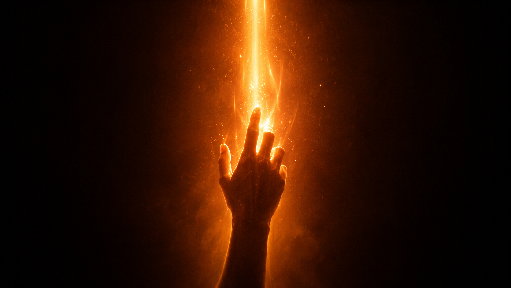 Warm orange light breaking across a dark landscape
